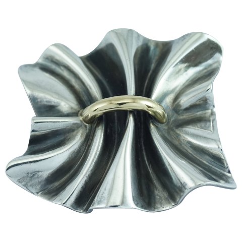 Georg Jensen, Lene Munthe; A brooch of sterling silver with gold