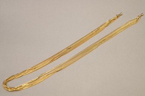 Ole Lynggaard; A necklace of 14k gold, six chains in one