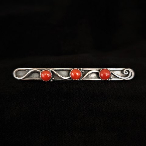 Just Andersen; A bracelet of sterling silver set with corals