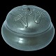 Hertz & Ballin; A pewter lid jar set with an amethyst