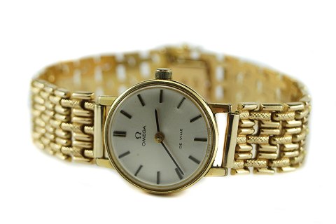 Omega De Ville; Ladies wristwatch of gilt steel and 18k gold