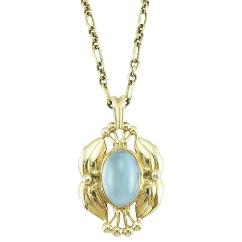 Georg Jensen; Heritage jewellery, 2000, of 18k gold with moonstone