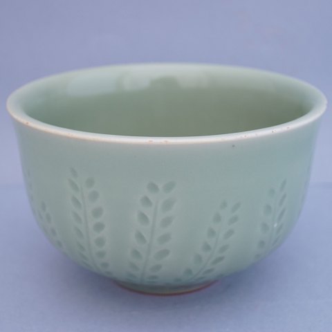 Royal Copenhagen, Gerd Bøgelund; A stoneware bowl with celadon glaze