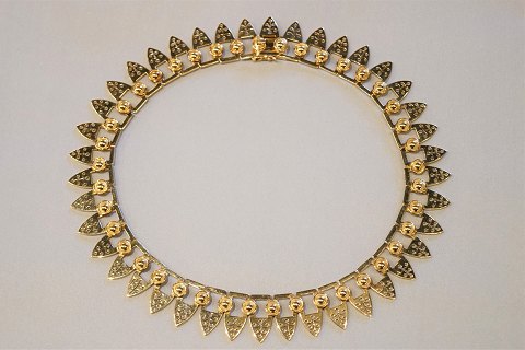 Christian Rasmussen; A necklace of 14k gold
