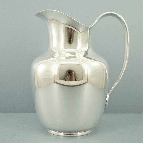 Cohr; A pitcher of sterling silver