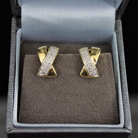 Aagaard; Earrings of 14k gold set with diamonds mounted in white gold
