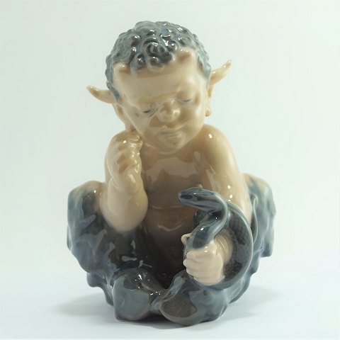 Royal Copenhagen; Figurine of porcelain, a faun with a snake #1712