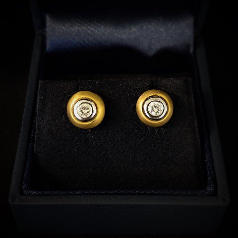 Earrings of 18k gold and white gold set with diamonds