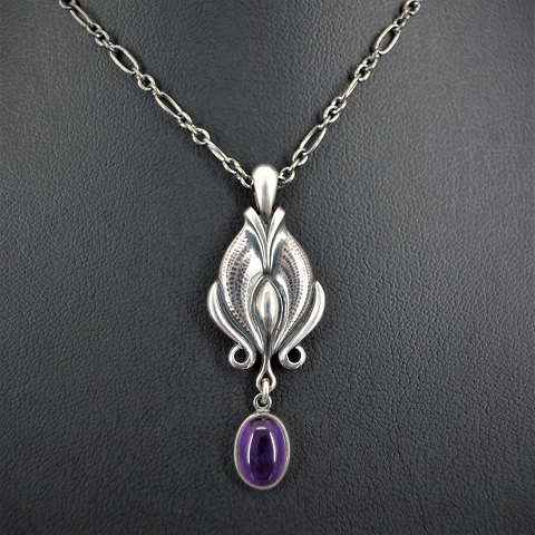 Georg Jensen; Heritage jewellery, 2012, made of sterling silver set with an 
amethyst