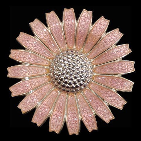 Georg Jensen; A Daisy brooch of sterling silver with pink enamel
