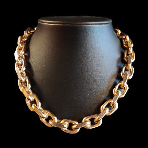 A heavy necklace of 14k gold, w. 11,5  mm