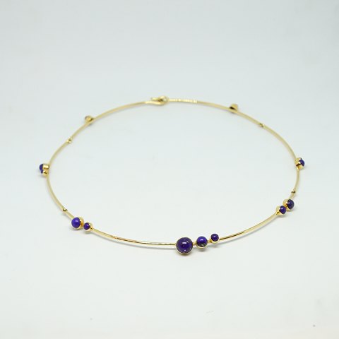 Karen Strand; Necklace of 14k gold with Lapis Lazuli