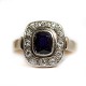H. Mann; Ring of 14k gold and white gold with a sapphire and diamonds