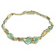 C. Antonsen; A bracelet of 14k gold set with emeralds