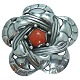 Georg Jensen; An art nouveau silver brooch set with a coral #12, 1904-1908