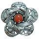 Georg Jensen; An art nouveau silver brooch set with a coral #12, 1904-1908