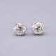 Pair of earrings set with one big brillant in each, in total 2,50 ct. mounted in 
14 kt. white gold