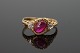 A ruby ring set with diamonds mounted in 14k gold, 1910 - 1920