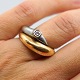 Ole Lynggaard; Fidelity ring of 14k gold and white gold, set with diamond